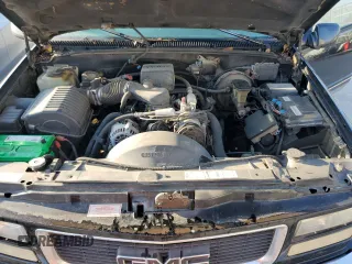 1997 GMC Yukon with VIN 1GKEK13R4VJ752757, listed as a Copart auction lot 75574214 with 251,193 mi miles and Clean Title. Bid and sale history available at carsss.com. Image 12.