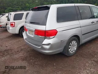 2010 Honda Odyssey LX with VIN 5FNRL3H21AB100181, listed as a IAAI auction lot 42258010 with 246,463 mi miles and . Bid and sale history available at DreamBid. Image 14.