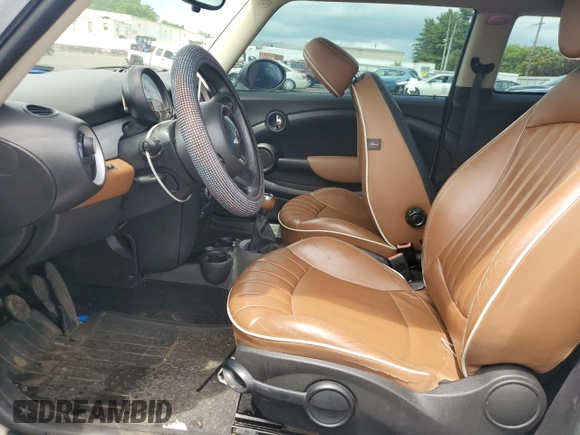 2013 MINI Hardtop with VIN WMWSU3C51DT374477, listed as a Copart auction lot 62654295 with 127,295 mi miles and Salvage title. Bid and sale history available at DreamBid. Image 7.