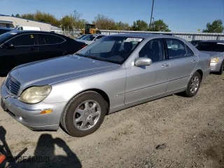2002 Mercedes-Benz S-Class 5.0L with VIN WDBNG75JX2A306811, listed as a Copart auction lot 52042105 with 206,531 mi miles and Salvage Title. Bid and sale history available at carsss.com. Image 1.