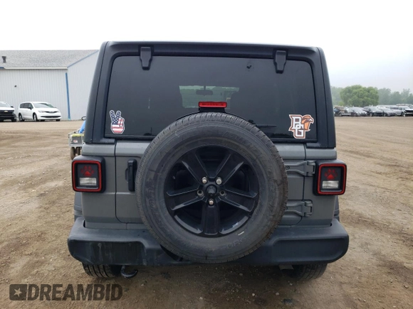 2020 Jeep Wrangler Unlimited Sport Altitude with VIN 1C4HJXDG2LW314301, listed as a Copart auction lot 59857615 with 60,684 mi miles and Salvage title. Bid and sale history available at DreamBid. Image 6.