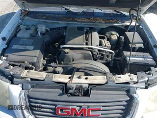 2003 GMC Envoy SLT with VIN 1GKDS13S832300090, listed as a IAAI auction lot 41993627 with 210,631 mi miles. Bid and sale history available at carsss.com. Image 10.
