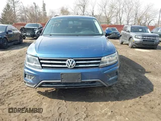 2018 Volkswagen Tiguan S with VIN 3VV1B7AX6JM108786, listed as a IAAI auction lot 41708099 with 162,289 mi miles and . Bid and sale history available at DreamBid. Image 12.