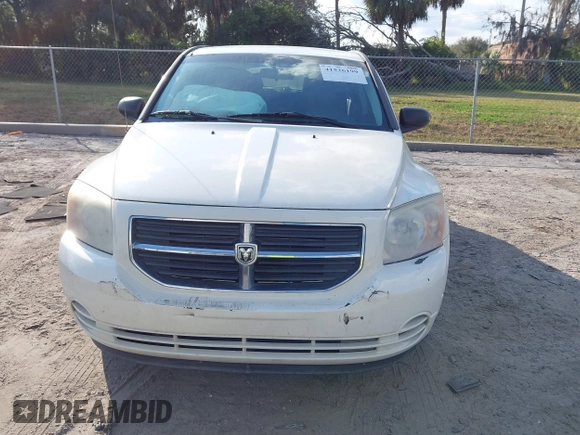 2009 Dodge Caliber SXT with VIN 1B3HB48A69D130857, listed as a IAAI auction lot 41526199 with 163,796 mi miles and . Bid and sale history available at DreamBid. Image 12.