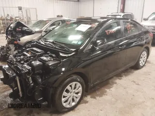2022 Hyundai Accent SE with VIN 3KPC24A65NE166577, listed as a IAAI auction lot 41708850 with 17,566 mi miles. Bid and sale history available at carsss.com. Image 2.
