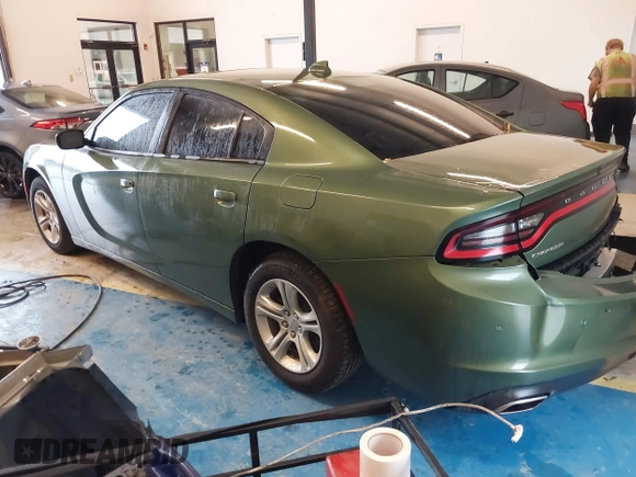 2023 Dodge Charger SXT with VIN 2C3CDXBG2PH698724, listed as a IAAI auction lot 41888564 with 21,717 mi miles and . Bid and sale history available at DreamBid. Image 3.