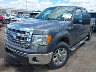 2013 Ford F-150 XL with VIN 1FTFW1CF8DKG49540, listed as a IAAI auction lot 42386031 with 151,073 mi miles and . Bid and sale history available at DreamBid. Image 2.