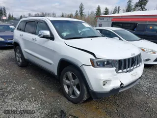 2013 Jeep Grand Cherokee Limited with VIN 1C4RJFBT0DC619216, listed as a IAAI auction lot 41703137 with 142,577 mi miles. Bid and sale history available at carsss.com. Image 1.