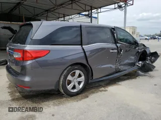 2019 Honda Odyssey EX-L with VIN 5FNRL6H75KB004911, listed as a Copart auction lot 48954335 with 74,720 mi miles and Clean Title. Bid and sale history available at carsss.com. Image 3.
