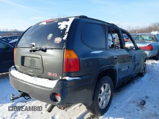 2005 GMC Envoy SLT with VIN 1GKDT13S152259771, listed as a IAAI auction lot 41340239 with 1 mi miles. Bid and sale history available at carsss.com. Image 4.