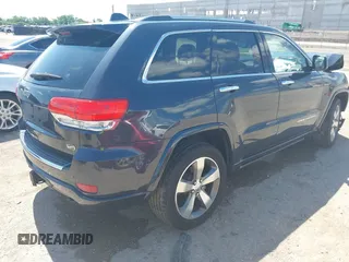 2015 Jeep Grand Cherokee High Altitude with VIN 1C4RJFCG5FC807394, listed as a IAAI auction lot 42452034 with 72,011 mi miles and . Bid and sale history available at DreamBid. Image 4.