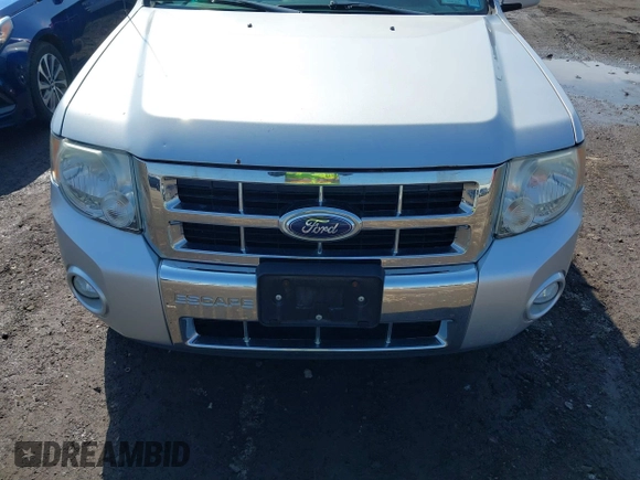 2011 Ford Escape Limited with VIN 1FMCU9EG8BKB38819, listed as a IAAI auction lot 41767666 with 127,490 mi miles. Bid and sale history available at carsss.com. Image 6.
