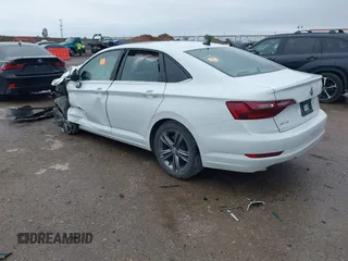 2021 Volkswagen Jetta S z VIN 3VWC57BUXMM017430, wystawiony jako IAAI lot #41947038 z przebiegiem 50 277 mil mil oraz . Historia ofert i sprzedaży dostępna na DreamBid. Obrazek 3.