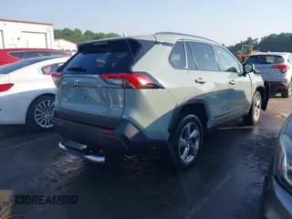 2021 Toyota RAV4 Hybrid LE with VIN JTMB6RFV3MD038562, listed as a IAAI auction lot 42576852 with 27,463 mi miles and . Bid and sale history available at DreamBid. Image 4.