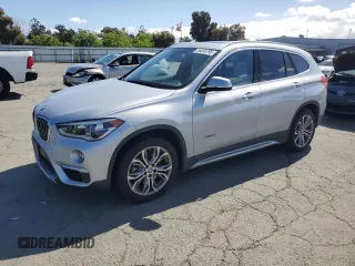 2017 BMW X1 xDrive28i z VIN WBXHT3Z36H4A54745, wystawiony jako Copart lot #56550795 z przebiegiem 38 017 mil mil oraz Szkoda całkowita • Salvage title. Historia ofert i sprzedaży dostępna na DreamBid. Obrazek 1.