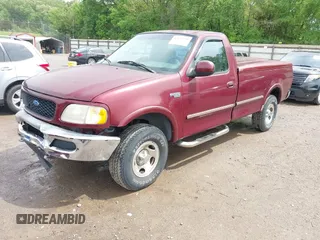 1997 Ford F-150 with VIN 1FTDF18W3VNA43627, listed as a IAAI auction lot 42132799 with 180,493 mi miles and . Bid and sale history available at DreamBid. Image 2.