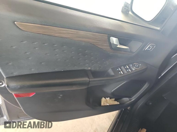 2020 Ford Escape Titanium Hybrid with VIN 1FMCU0DZ2LUB82013, listed as a IAAI auction lot 42727391 with 92,623 mi miles and . Bid and sale history available at DreamBid. Image 6.