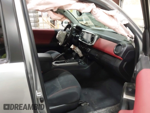 2023 Toyota Tacoma SR with VIN 3TMCZ5AN9PM604793, listed as a IAAI auction lot 42251347 with 39,741 mi miles and . Bid and sale history available at DreamBid. Image 5.