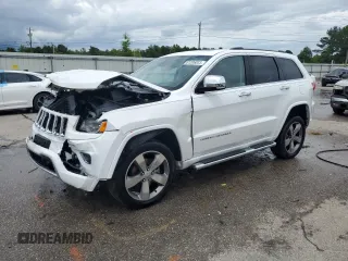 2015 Jeep Grand Cherokee Overland with VIN 1C4RJFCGXFC891616, listed as a Copart auction lot 61386065 with 90,011 mi miles and Salvage title. Bid and sale history available at DreamBid. Image 1.