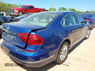 2016 Volkswagen Passat S with VIN 1VWAT7A36GC048458, listed as a IAAI auction lot 42001799 with 50,962 mi miles and . Bid and sale history available at DreamBid. Image 4.