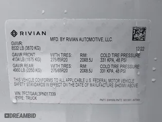 2023 Rivian R1T Launch Edition with VIN 7FCTGAAL3PN017339, listed as a IAAI auction lot 42041423 with 15,098 mi miles. Bid and sale history available at carsss.com. Image 9.