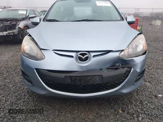 2013 Mazda 2 Sport z VIN JM1DE1KZ0D0167646, wystawiony jako IAAI lot #41335289 z przebiegiem 48 380 mil mil oraz . Historia ofert i sprzedaży dostępna na DreamBid. Obrazek 6.