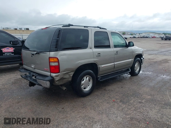 2003 GMC Yukon SLT z VIN 1GKEC13Z03R314068, wystawiony jako IAAI lot #42132464 z przebiegiem 214 826 mil mil oraz . Historia ofert i sprzedaży dostępna na DreamBid. Obrazek 4.