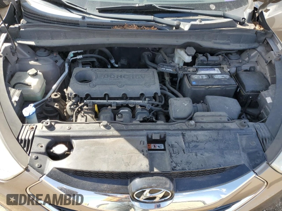 2010 Hyundai Tucson GLS with VIN KM8JU3AC8AU056499, listed as a Copart auction lot 53057365 with 119,906 mi miles and Salvage Title. Bid and sale history available at DreamBid. Image 11.