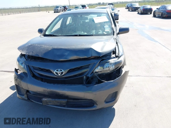 2012 Toyota Corolla L with VIN 2T1BU4EE9CC831743, listed as a IAAI auction lot 41870966 with 166,548 mi miles. Bid and sale history available at carsss.com. Image 6.