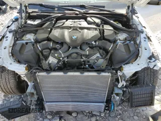 2023 BMW 8 Series M850i with VIN WBAGV8C01PCM79724, listed as a Copart auction lot 69486194 with 14,285 mi miles and Salvage title. Bid and sale history available at DreamBid. Image 11.
