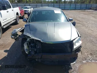 2013 Dodge Avenger SXT with VIN 1C3CDZCG7DN585431, listed as a IAAI auction lot 41975228 with 152,703 mi miles and . Bid and sale history available at carsss.com. Image 12.