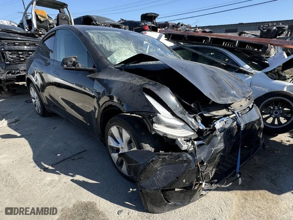 2020 Tesla Model Y Long Range with VIN 5YJYGDEE9LF055157, listed as a IAAI auction lot 42012520 with 45,282 mi miles. Bid and sale history available at carsss.com. Image 1.