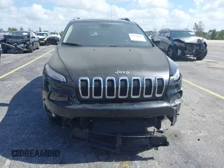 2015 Jeep Cherokee Latitude with VIN 1C4PJLCB4FW683904, listed as a IAAI auction lot 41579059 with 126,156 mi miles and . Bid and sale history available at carsss.com. Image 6.