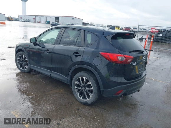 2016 Mazda CX-5 Grand Touring with VIN JM3KE4DY3G0769448, listed as a IAAI auction lot 41947725 with 154,051 mi miles and . Bid and sale history available at carsss.com. Image 3.