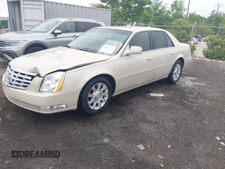 2011 Cadillac DTS z VIN 1G6KA5E65BU139507, wystawiony jako IAAI lot #42236497 z przebiegiem 118 332 mil mil oraz . Historia ofert i sprzedaży dostępna na DreamBid. Obrazek 2.