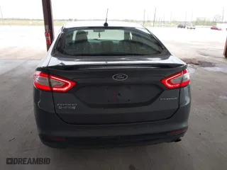 2016 Ford Fusion Energi Titanium with VIN 3FA6P0SU9GR103245, listed as a IAAI auction lot 41888435 with 123,975 mi miles. Bid and sale history available at carsss.com. Image 16.