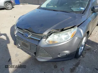 2013 Ford Focus SE with VIN 1FADP3K29DL220311, listed as a IAAI auction lot 41790487 with 136,257 mi miles. Bid and sale history available at carsss.com. Image 6.