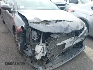 2019 Toyota Camry LE with VIN 4T1B11HK4KU254853, listed as a IAAI auction lot 42013255 with 153,664 mi miles and . Bid and sale history available at DreamBid. Image 6.