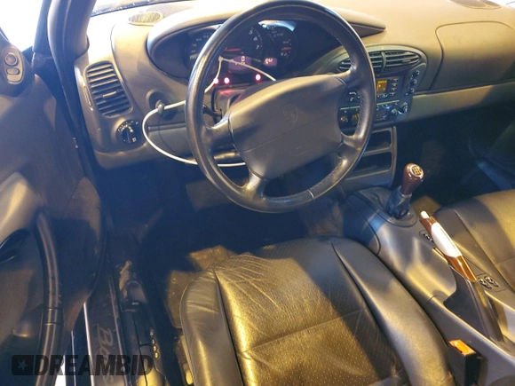 1999 Porsche Boxster z VIN WP0CA2983XU630435, wystawiony jako Copart lot #47402785 z przebiegiem 62 180 mil mil oraz Szkoda całkowita • Salvage title. Historia ofert i sprzedaży dostępna na DreamBid. Obrazek 8.
