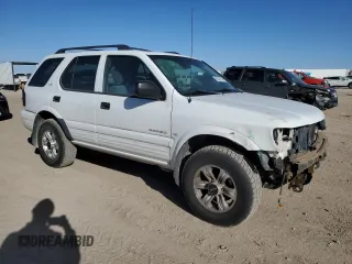 2001 Isuzu Rodeo S z VIN 4S2DM58W114306215, wystawiony jako Copart lot #85287914 z przebiegiem 157 844 mil mil oraz Szkoda całkowita • Salvage title. Historia ofert i sprzedaży dostępna na DreamBid. Obrazek 4.