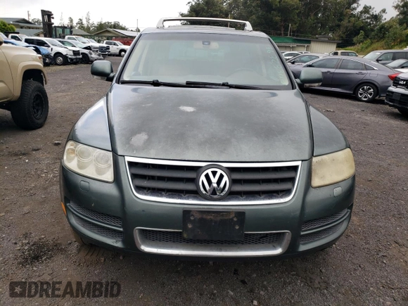 2006 Volkswagen Touareg 4.2L V8 z VIN WVGZM77L16D049631, wystawiony jako Copart lot #84882844 z przebiegiem Nie podano mil oraz Szkoda całkowita • Salvage title. Historia ofert i sprzedaży dostępna na DreamBid. Obrazek 5.