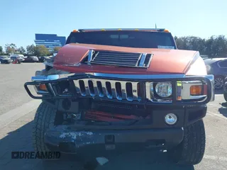 2003 Hummer H2 with VIN 5GRGN23U23H104200, listed as a IAAI auction lot 41687769 with 1 mi miles. Bid and sale history available at carsss.com. Image 12.