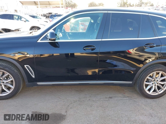 2023 BMW X5 sDrive40i with VIN 5UXCR4C01P9R58557, listed as a IAAI auction lot 41826741 with 10,142 mi miles. Bid and sale history available at carsss.com. Image 14.