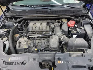 2013 Ford Taurus SEL with VIN 1FAHP2E82DG149828, listed as a IAAI auction lot 41910513 with 130,594 mi miles and . Bid and sale history available at carsss.com. Image 10.