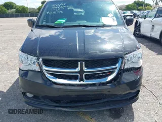 2019 Dodge Grand Caravan SXT with VIN 2C4RDGCG5KR797853, listed as a IAAI auction lot 40332854 with 81,197 mi miles and . Bid and sale history available at DreamBid. Image 12.