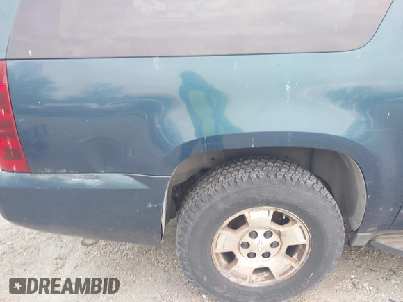 2007 Chevrolet Suburban LS with VIN 1GNFC16J47R207494, listed as a IAAI auction lot 41942690 with Not provided miles and . Bid and sale history available at DreamBid. Image 13.