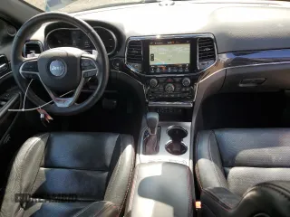 2019 Jeep Grand Cherokee Trailhawk with VIN 1C4RJFLT8KC726784, listed as a Copart auction lot 66010235 with 136,683 mi miles and Salvage title. Bid and sale history available at DreamBid. Image 8.
