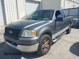 2005 Ford F-150 XLT with VIN 1FTPX12575NA22872, listed as a IAAI auction lot 41532157 with 261,093 mi miles. Bid and sale history available at carsss.com. Image 2.