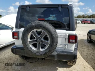 2021 Jeep Wrangler Sport with VIN 1C4GJXAG8MW621800, listed as a Copart auction lot 75312824 with 49,409 mi miles and Non Repairable. Bid and sale history available at DreamBid. Image 6.