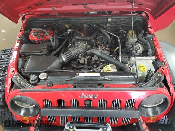2008 Jeep Wrangler X with VIN 1J4FA24118L501599, listed as a Copart auction lot 52776475 with 74,186 mi miles and Salvage Title. Bid and sale history available at DreamBid. Image 11.